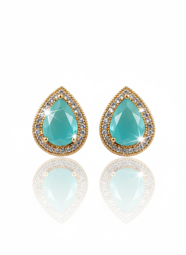 Teardrop-shaped earrings with turquoise stones and gold accents on a white background