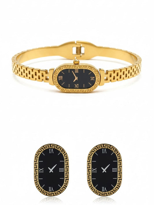 Gold bracelet watch with black face and Roman numerals on a white background