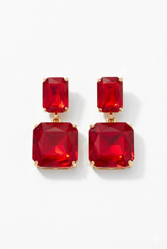Red gemstone earrings on a white background